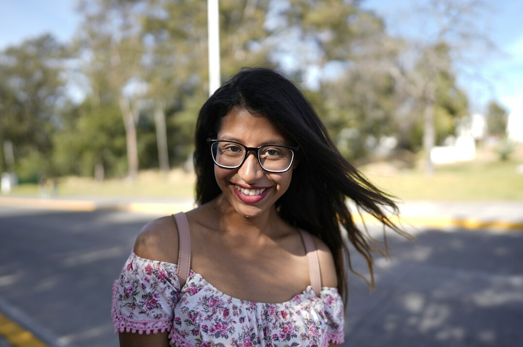 Portrait of a young Latina reporter