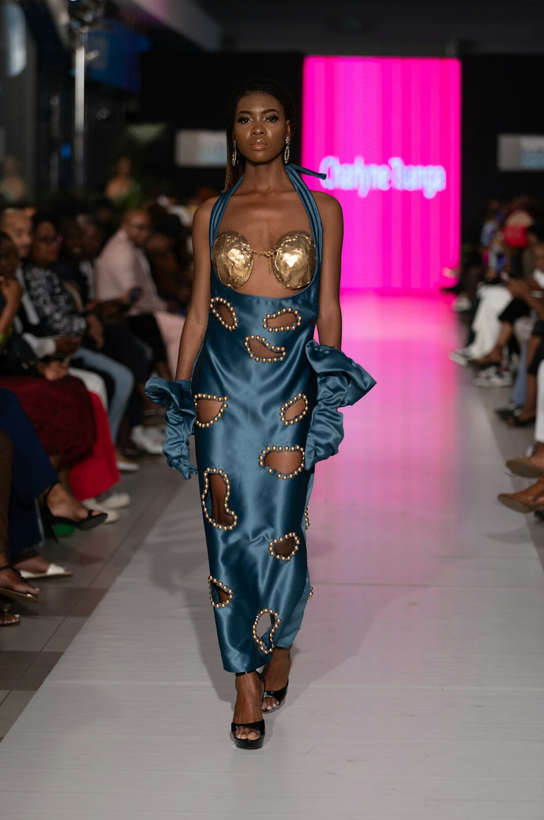 Fashion runway show with models walking